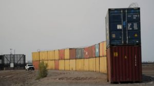 Arizona says shipping containers at Mexico border lawful, will remain in use