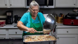 Woman sues Arizona city after her arrest for feeding homeless people in parks