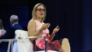Here's what Arizona Sen. Kyrsten Sinema had to say on Title 42 and Ducey's shipping container wall