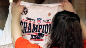 What happens to the losing team's Super Bowl champions merchandise?