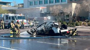 Tesla catches fire, causes road closure, after crashing in Scottsdale