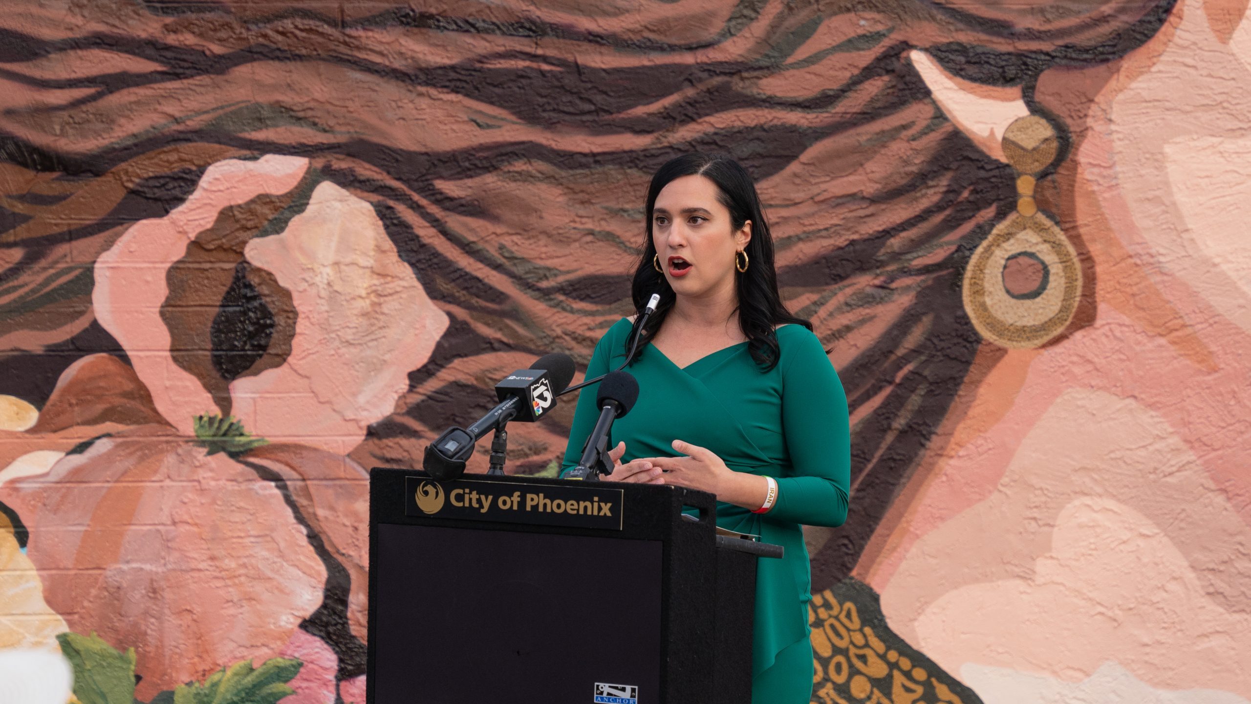 Phoenix Vice Mayor Yassamin Ansari speaks at the unveiling of a mural to honor Iranian women titled...