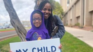 Supporters of Arizona’s school vouchers program march at State Capitol