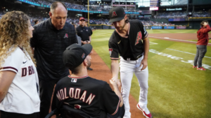 D-backs' Luis Gonzalez shares special moment with Phoenix officer Tyler Moldovan at home opener