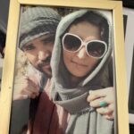 framed photo of Sima and her husband 