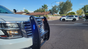 Police shoot suspect in Phoenix neighborhood, 1 person detained