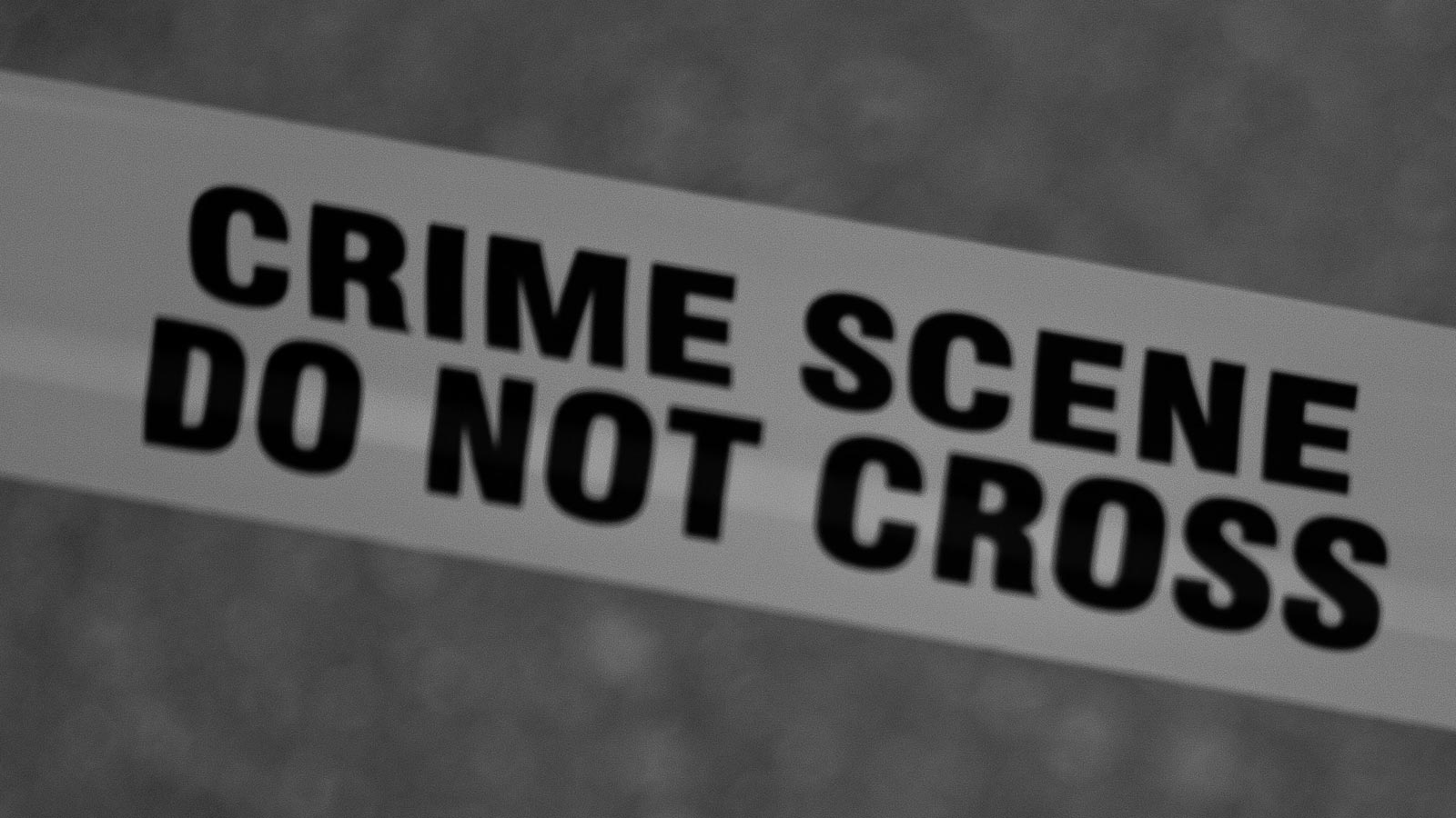 Stock image of police tape that says "Crime Scene Do Not Cross." A truck with a 12-year-old child i...