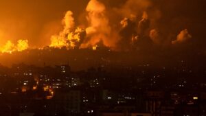 Israel strikes and seals off Gaza after incursion by Hamas, which vows to execute hostages