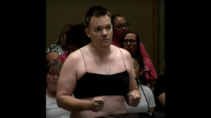 Dad protesting Higley USD dress code policy explains why he stripped down