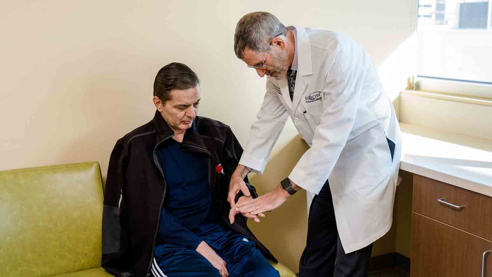 Doctor looking at patient...