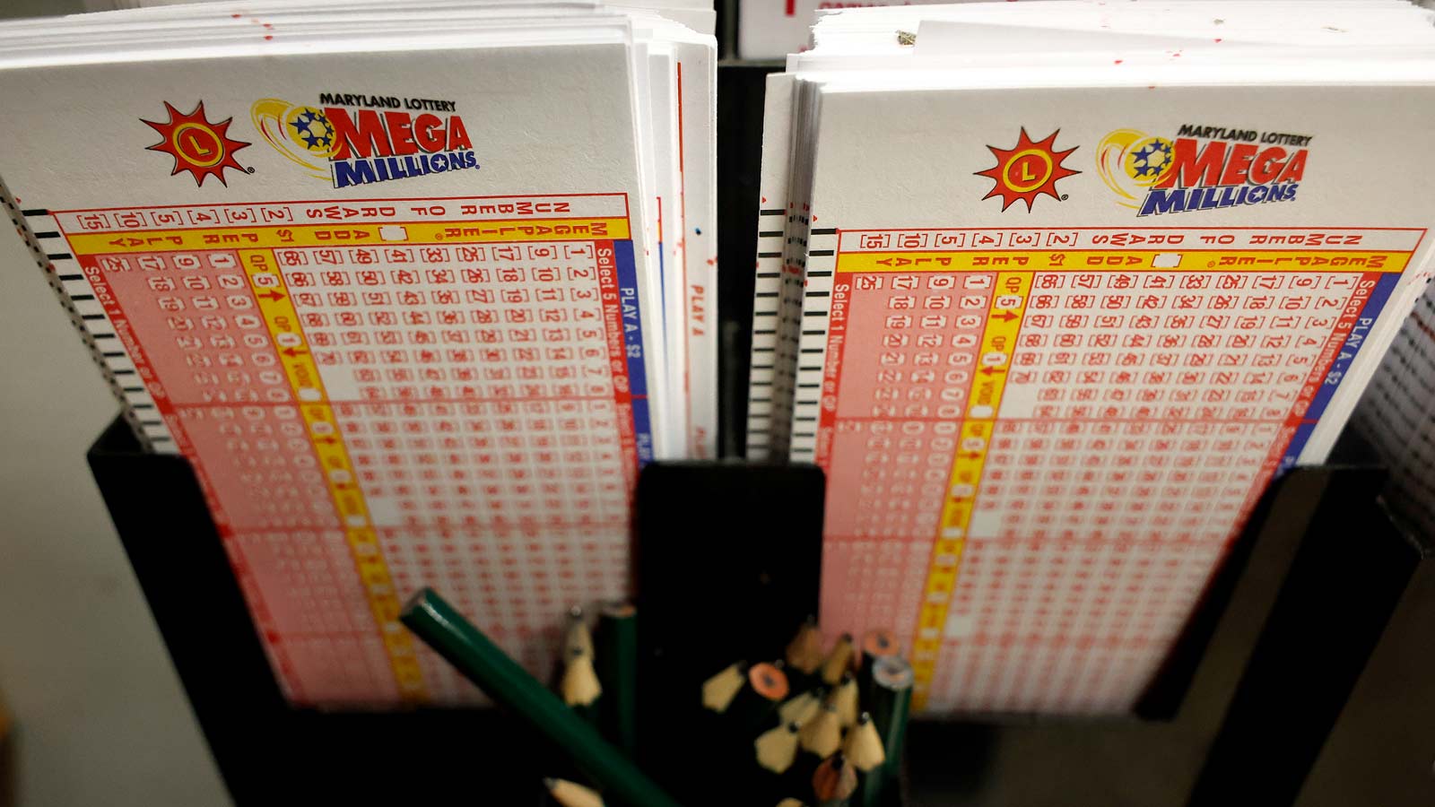 Mega Millions forms are stacked and waiting on players on Aug. 7, 2023, in Silver Spring, Maryland....