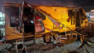 Neighbor rescues man from burning mobile home in Phoenix