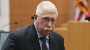 Sentencing postponed for retired Arizona prisons boss who pleaded no-contest in armed standoff