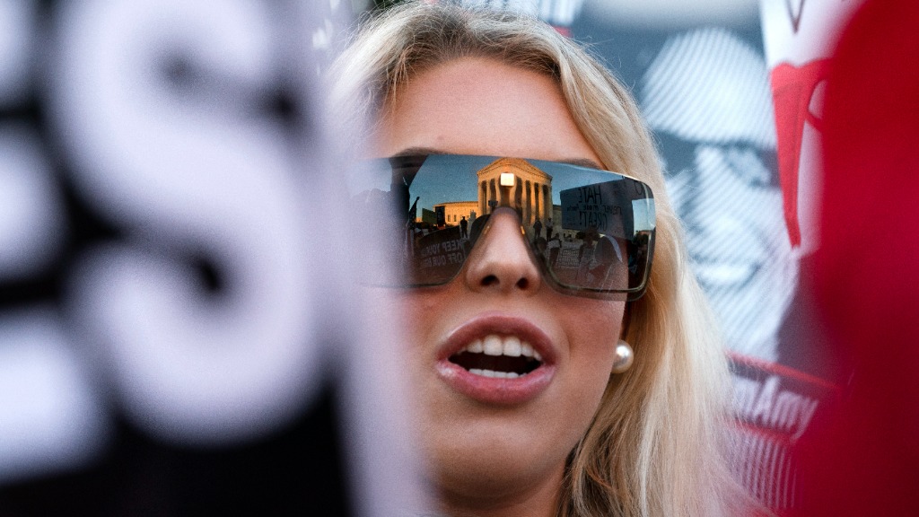 FILE - Isabella DeLuca, of Long Island, N.Y., appears outside the Supreme Court, Oct. 26, 2020, on ...