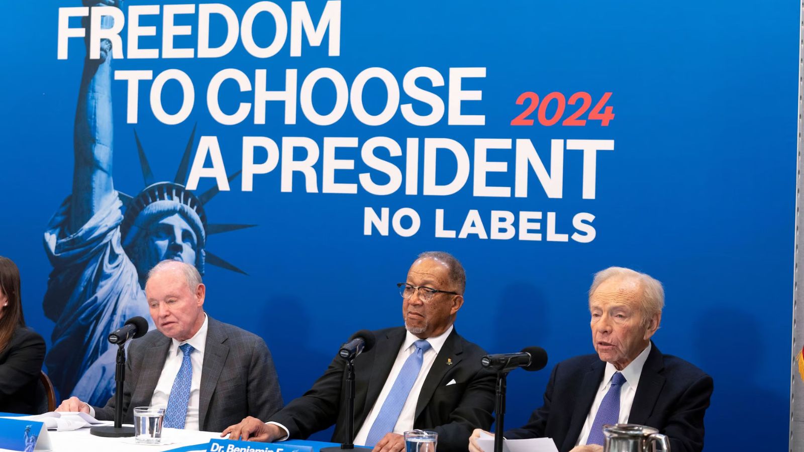 No Labels leadership and guests from left, Dan Webb, National Co-Chair Dr. Benjamin F. Chavis, and ...