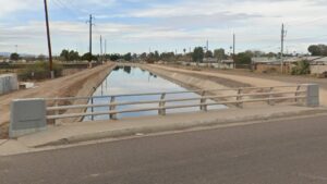 Body found in vehicle on fire in west Phoenix canal