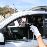 Bullet hole in Phoenix police patrol vehicle. 