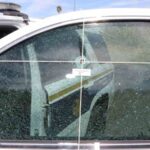 Bullet hole in Phoenix police patrol vehicle. 