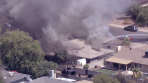 Body of woman found in home burned during standoff with US Marshals in Tempe