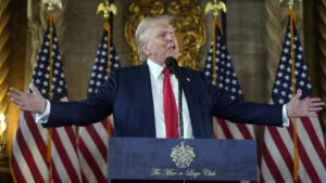 Trump recommits to a Sept. 10 debate and lashes out at Harris at news conference