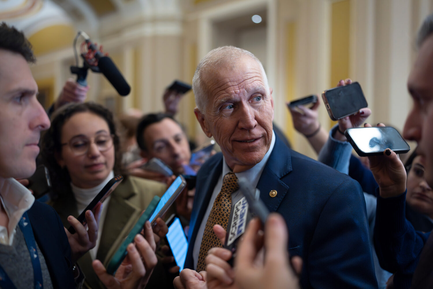 Sen. Thom Tillis, R-N.C., speaks with reporters following a closed-door meeting with fellow Republi...