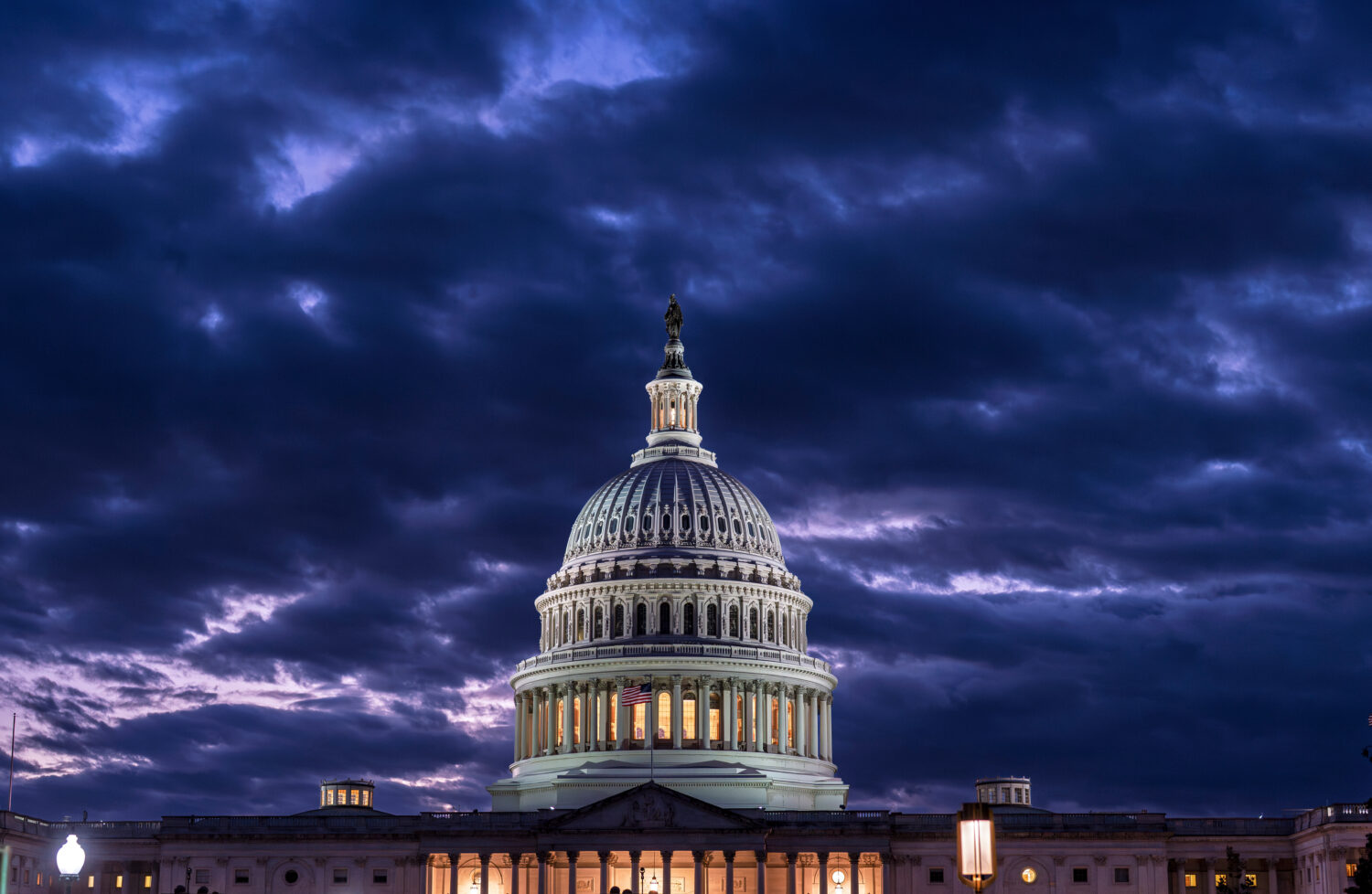 FILE - The Capitol is seen at nightfall in Washington on Oct. 22, 2025. (AP Photo/J. Scott Applewhi...