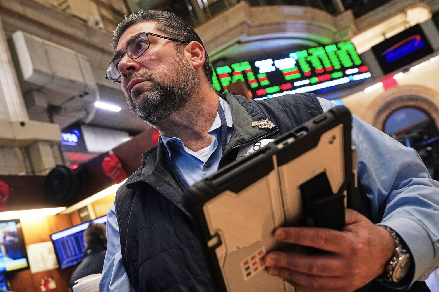 Trader Michael Capolino works on the floor of the New York Stock Exchange, Monday, Jan. 12, 2026. (...