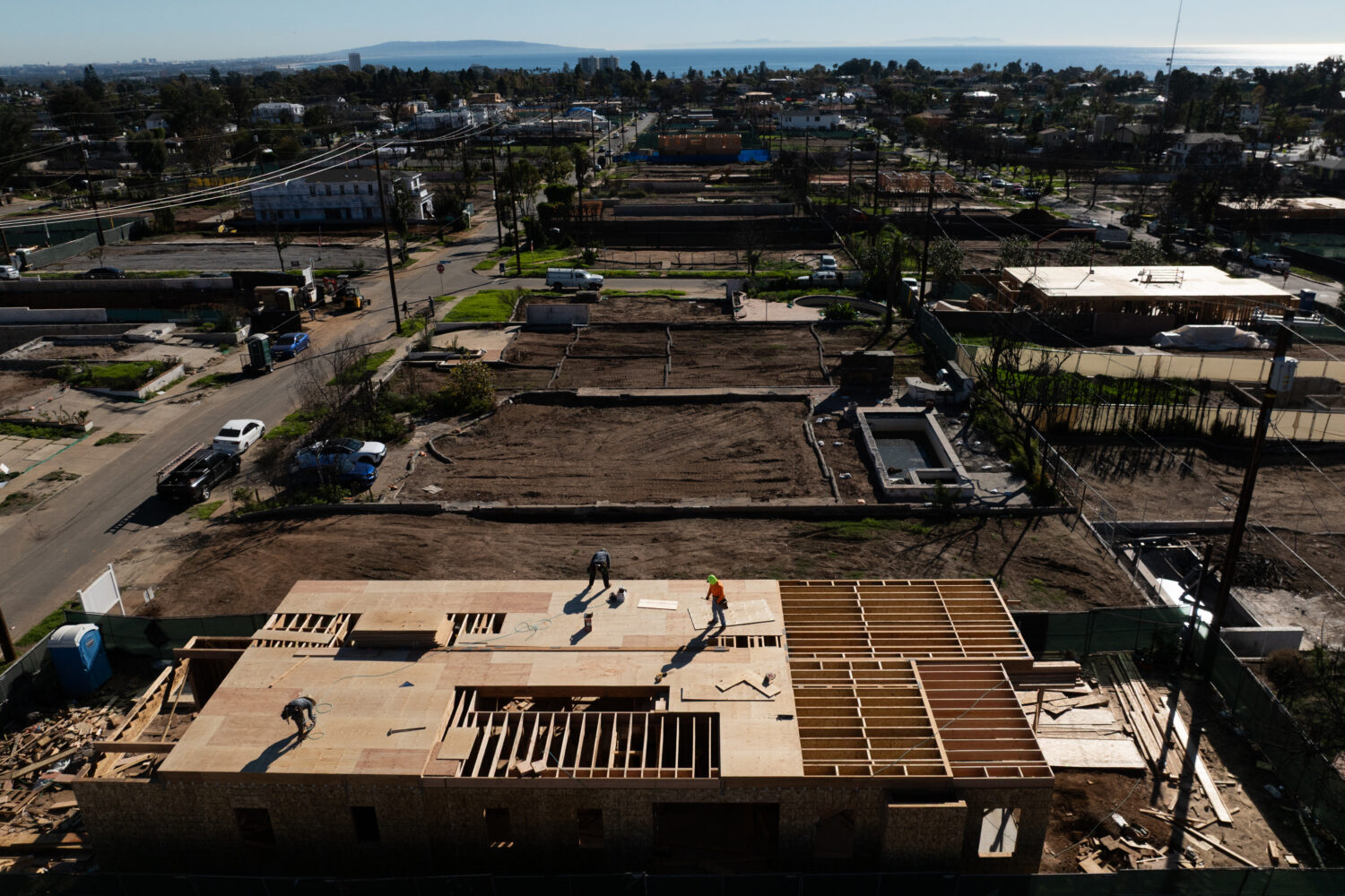 An aerial view shows houses being rebuilt on cleared lots months after the Palisades Fire, Dec. 5, ...