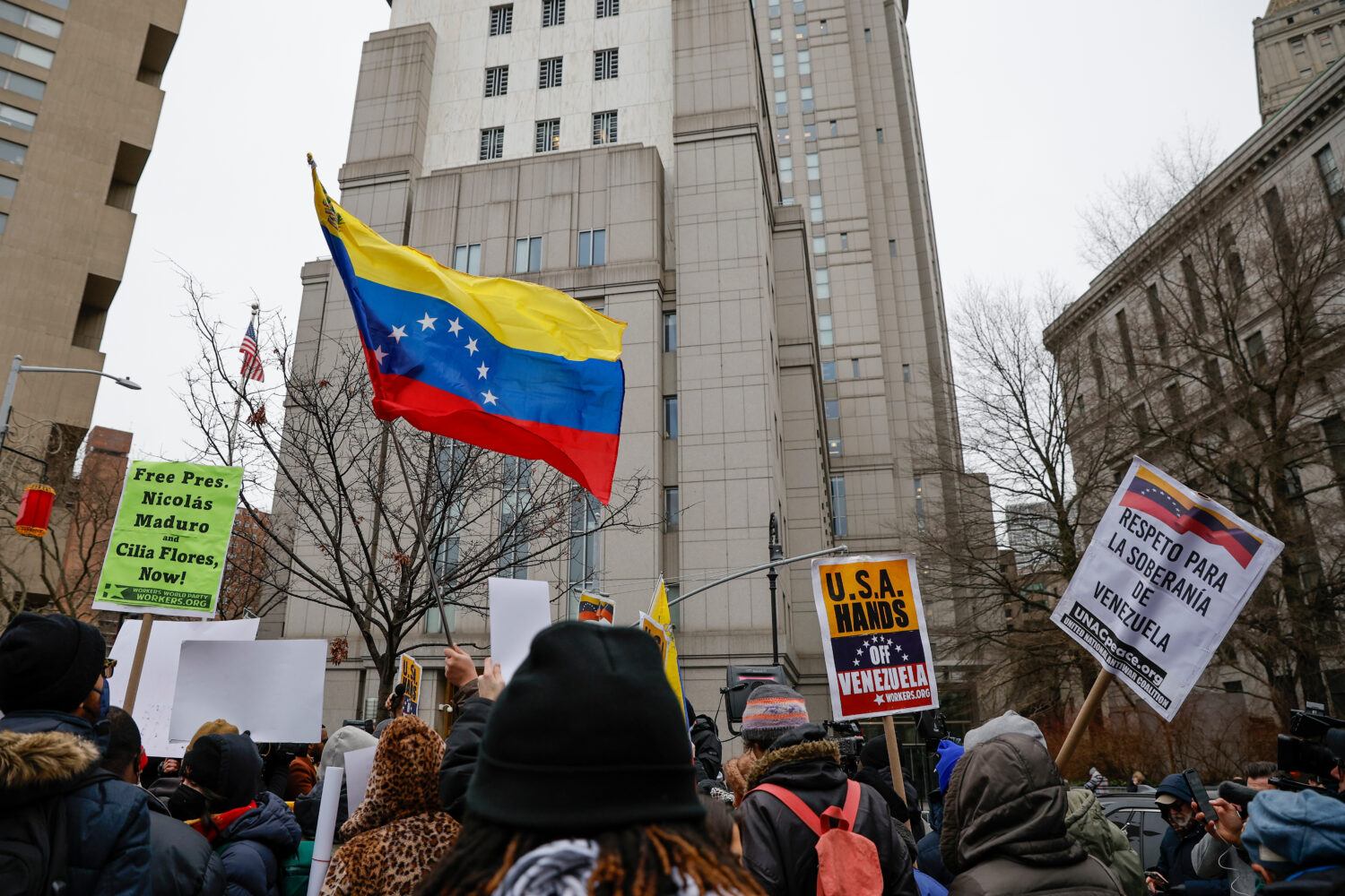 People protest outside Manhattan Federal Court before the arraignment of Venezuelan President Nicol...