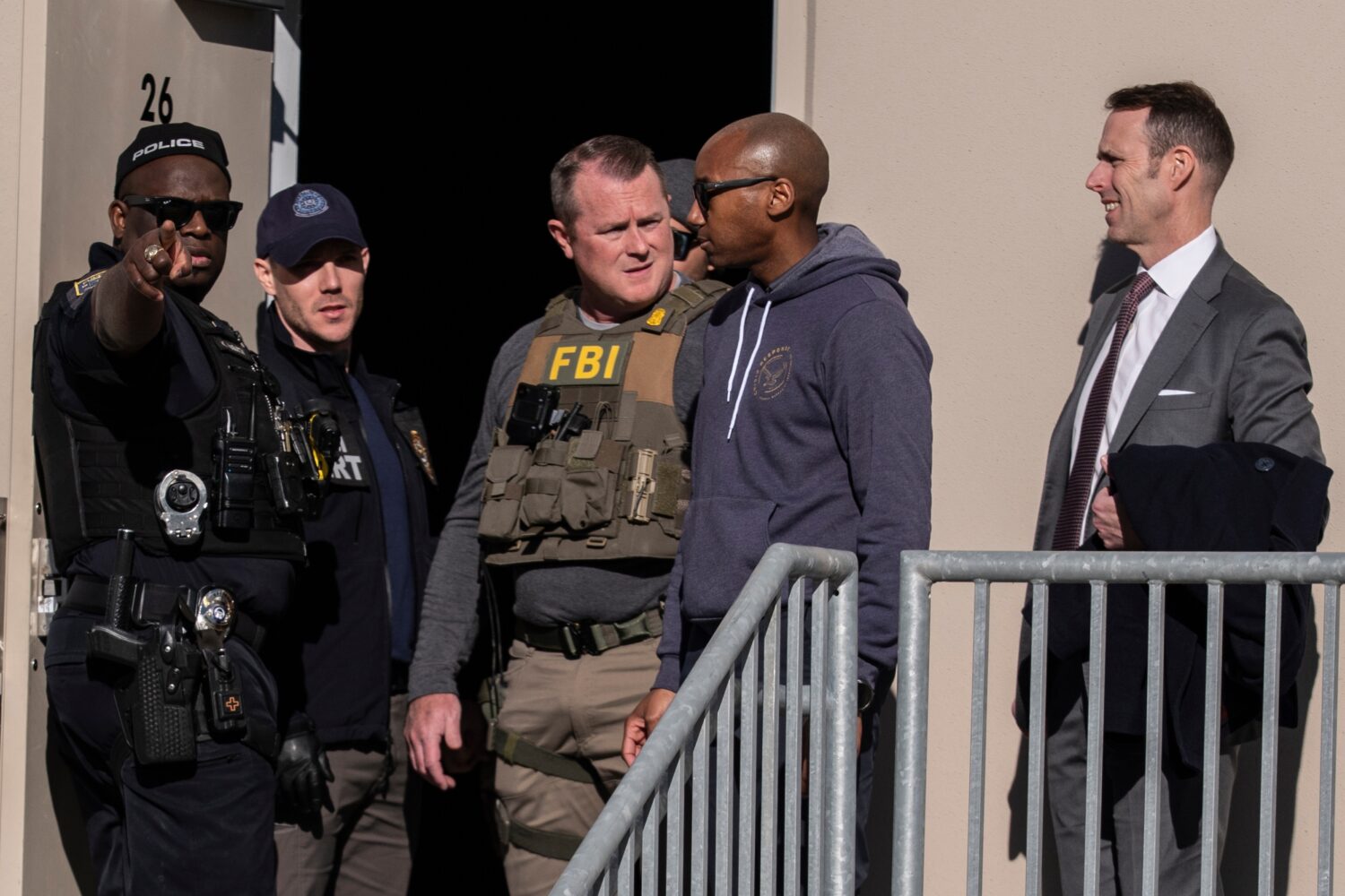 FBI agents are seen at the Fulton County Election Hub and Operation Center, Wednesday, Jan. 28, 202...