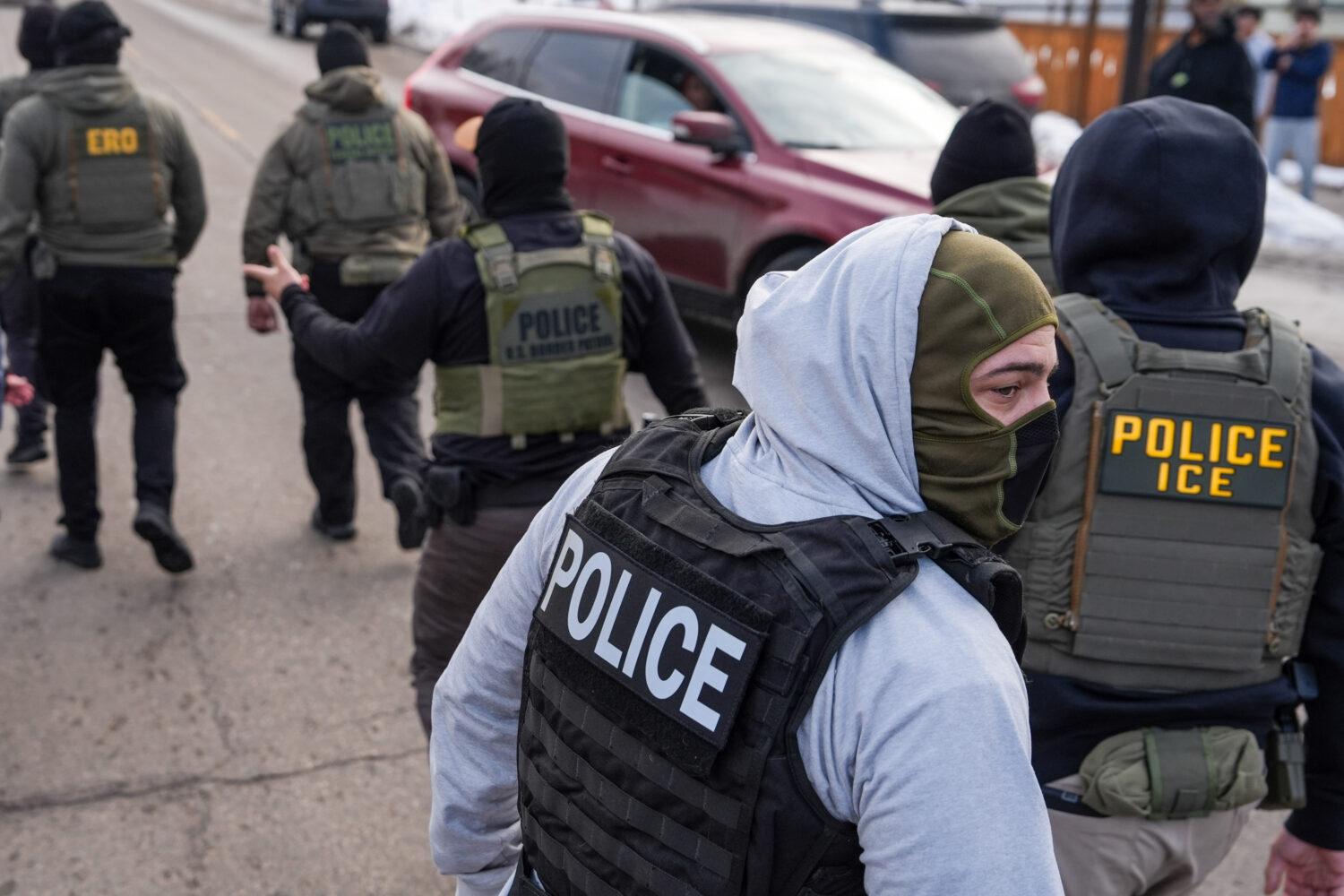 FILE - Federal agents conduct immigration enforcement operations Thursday, Feb. 5, 2026, in Minneap...