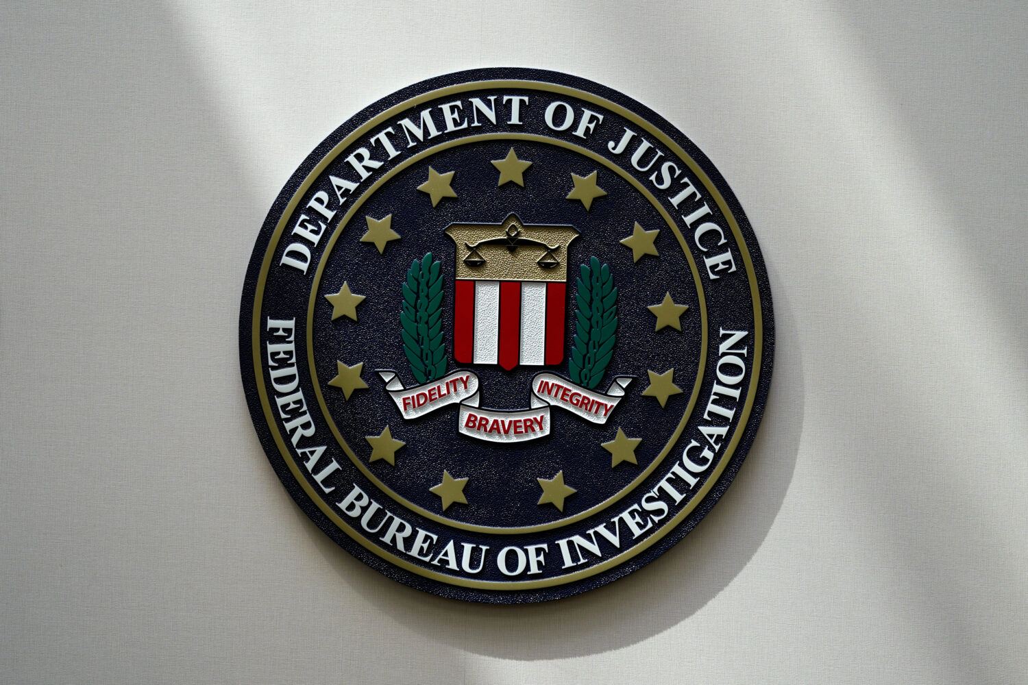 FILE - The FBI seal is pictured in Omaha, Neb., Aug. 10, 2022. (AP Photo/Charlie Neibergall, File)C...