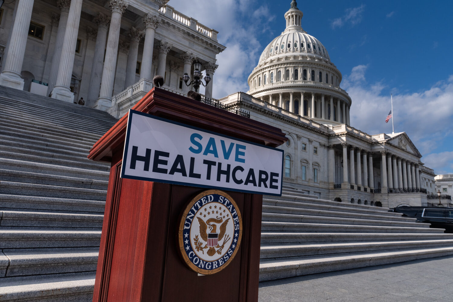FILE - A lectern awaits the arrival of House Democrats to speak on the health care funding fight on...