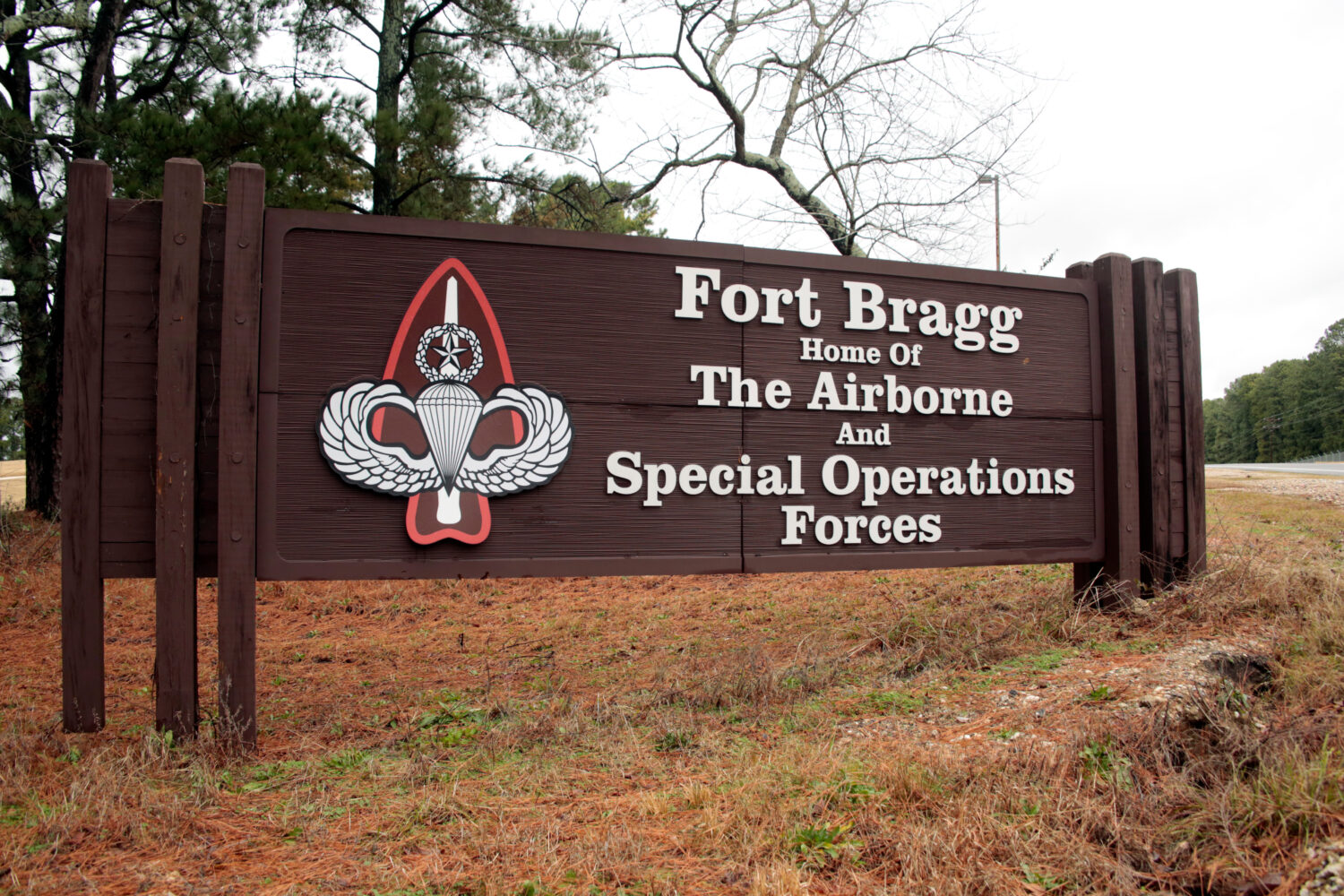 FILE - A sign at an entrance gate at Fort Bragg, N.C., is photographed on Jan. 4, 2020. (AP Photo/C...