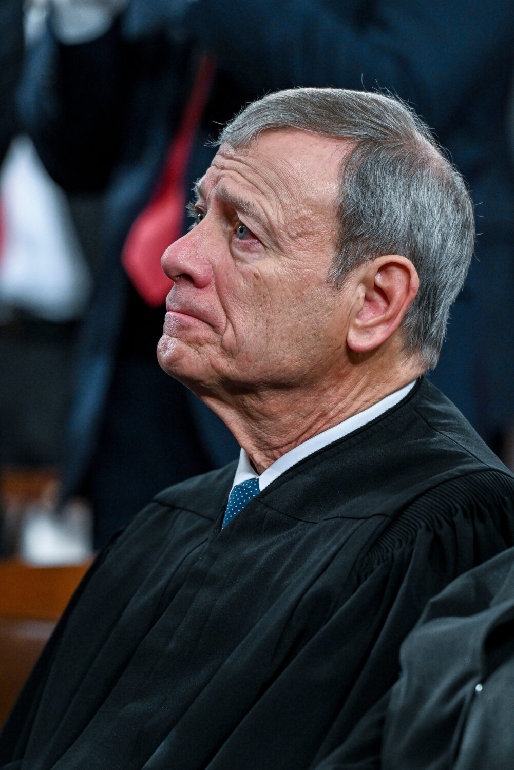 Chief Justice John Roberts watches as President Donald Trump delivers the State of the Union addres...