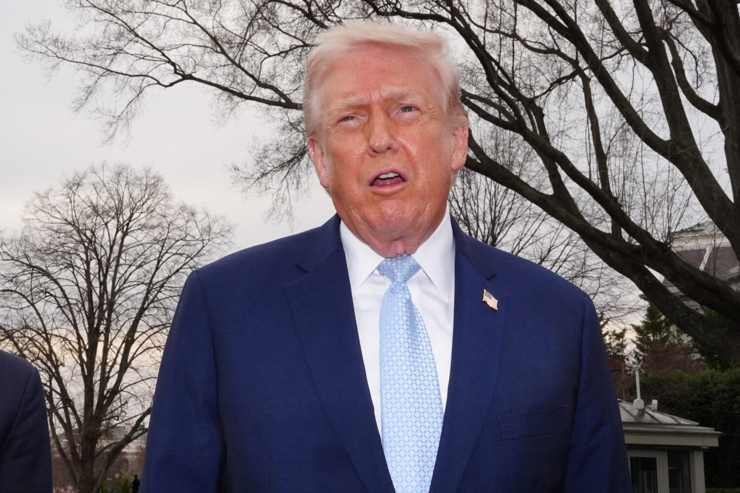 President Donald Trump speaks with reporters before departing on Marine One from the South Lawn of ...