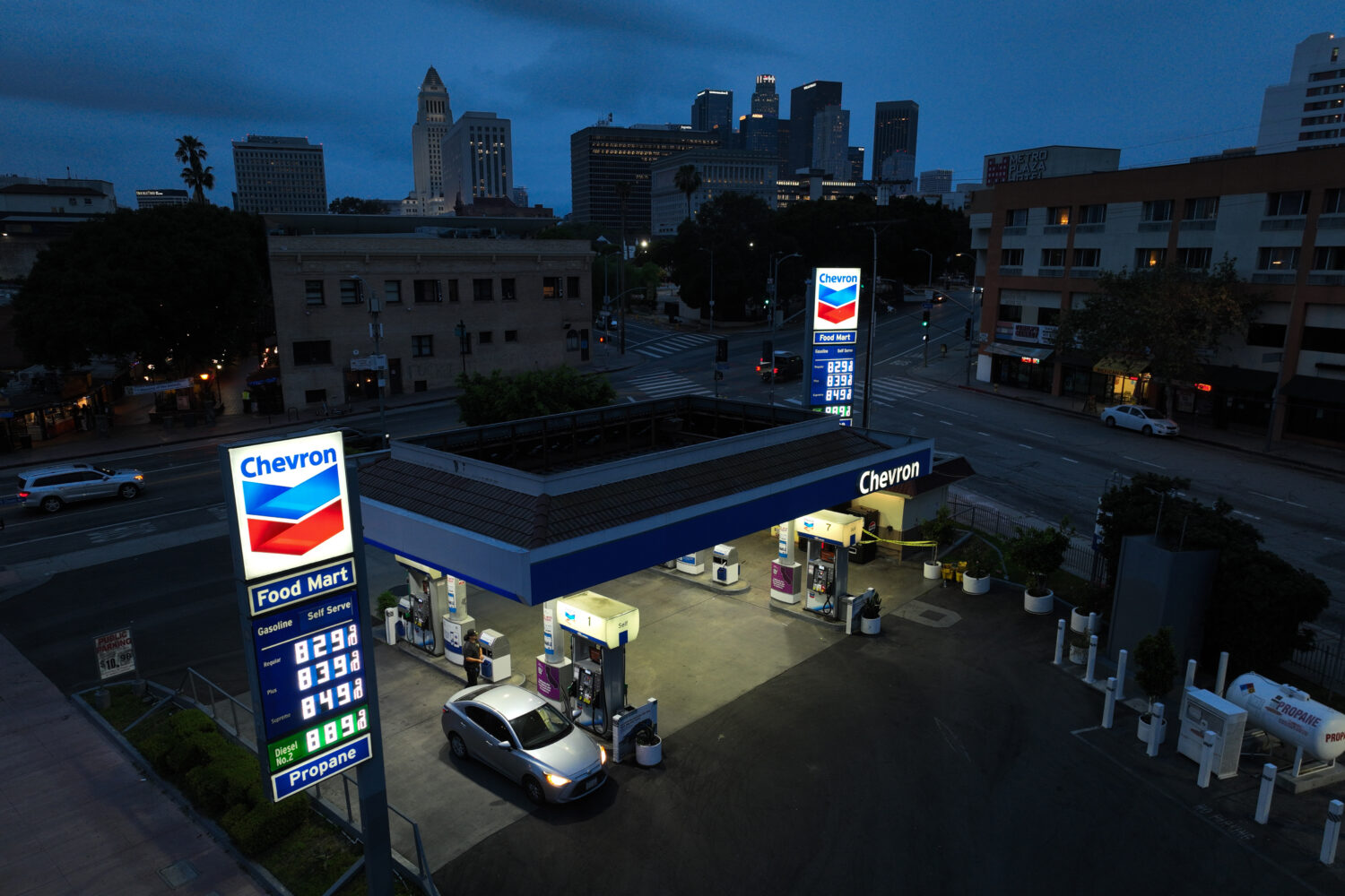Gas prices are displayed at a Chevron gas station, in downtown Los Angeles, Tuesday, March 31, 2026...