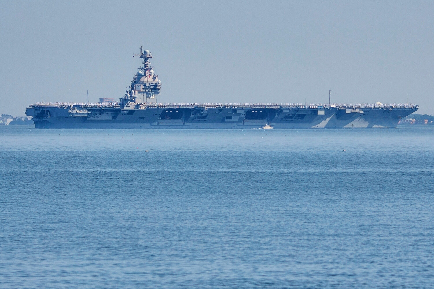 FILE - The USS Gerald R. Ford aircraft carrier leaves Naval Station Norfolk, June 23, 2025, in Norf...