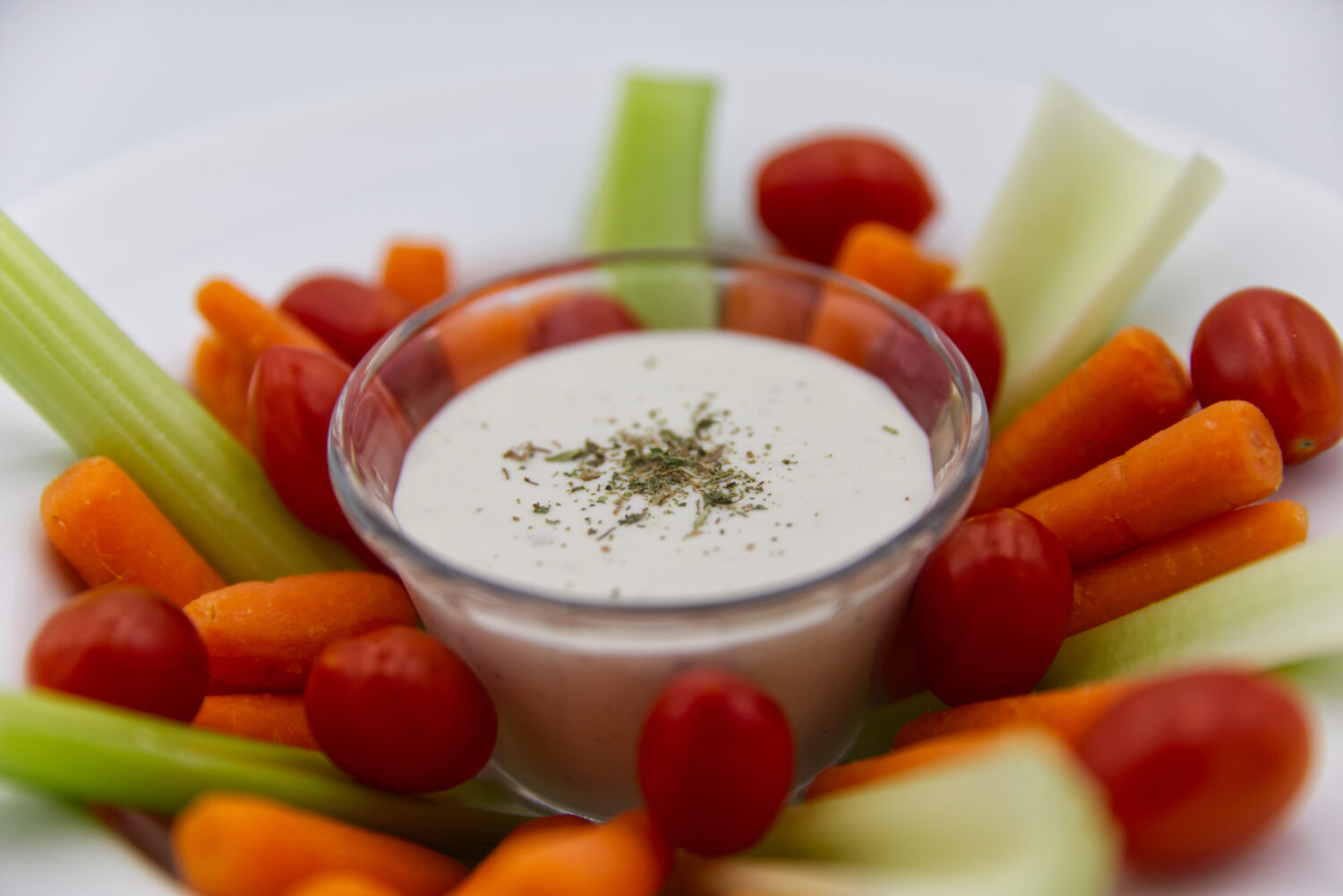 Ranch dressing is served with raw vegetables in Phoenix, Monday, April 13, 2026. (AP Photo/Dario Lo...