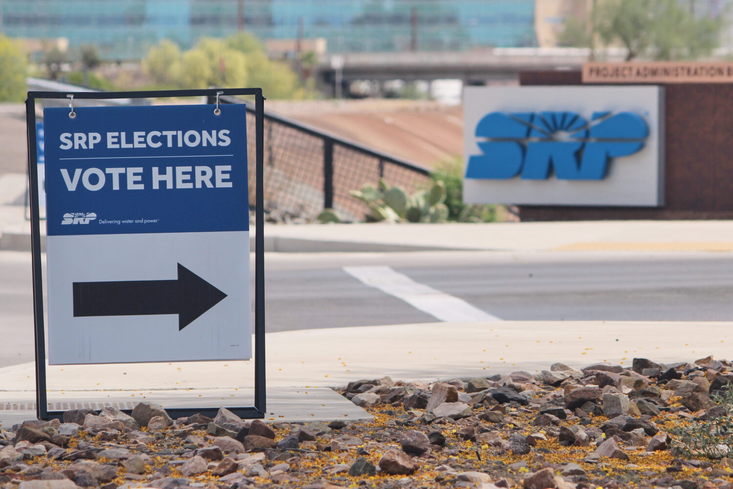 A sign directing voters sits outside the headquarters of Salt River Project on Monday, March 30, 20...