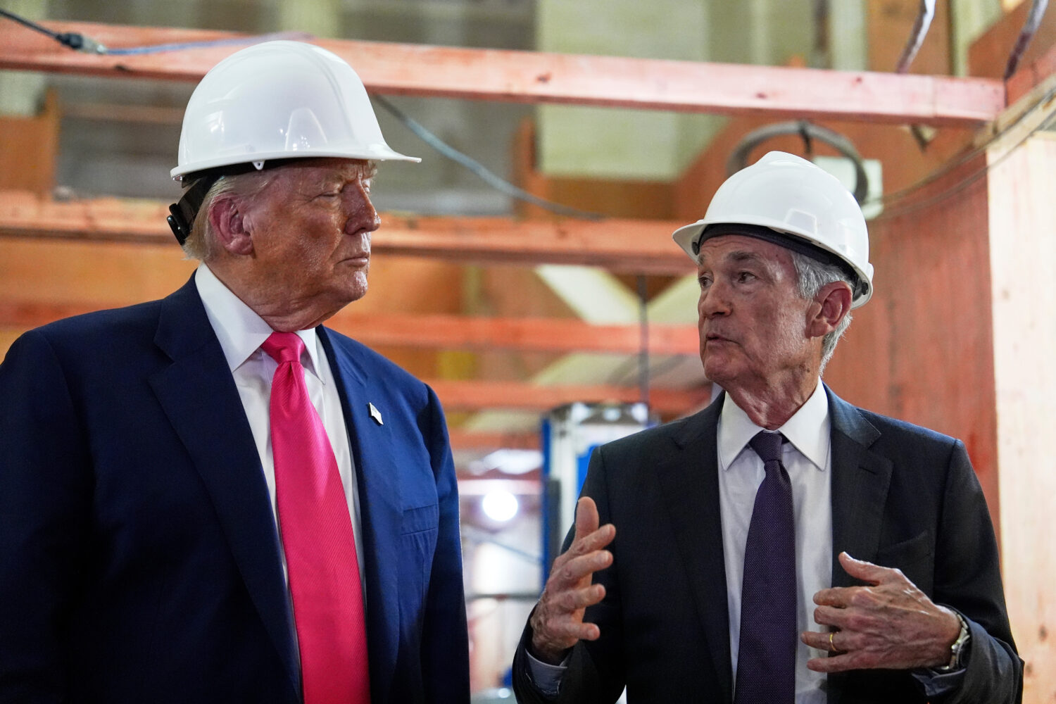 FILE - President Donald Trump listens to Federal Reserve Chairman Jerome Powell speak during a visi...