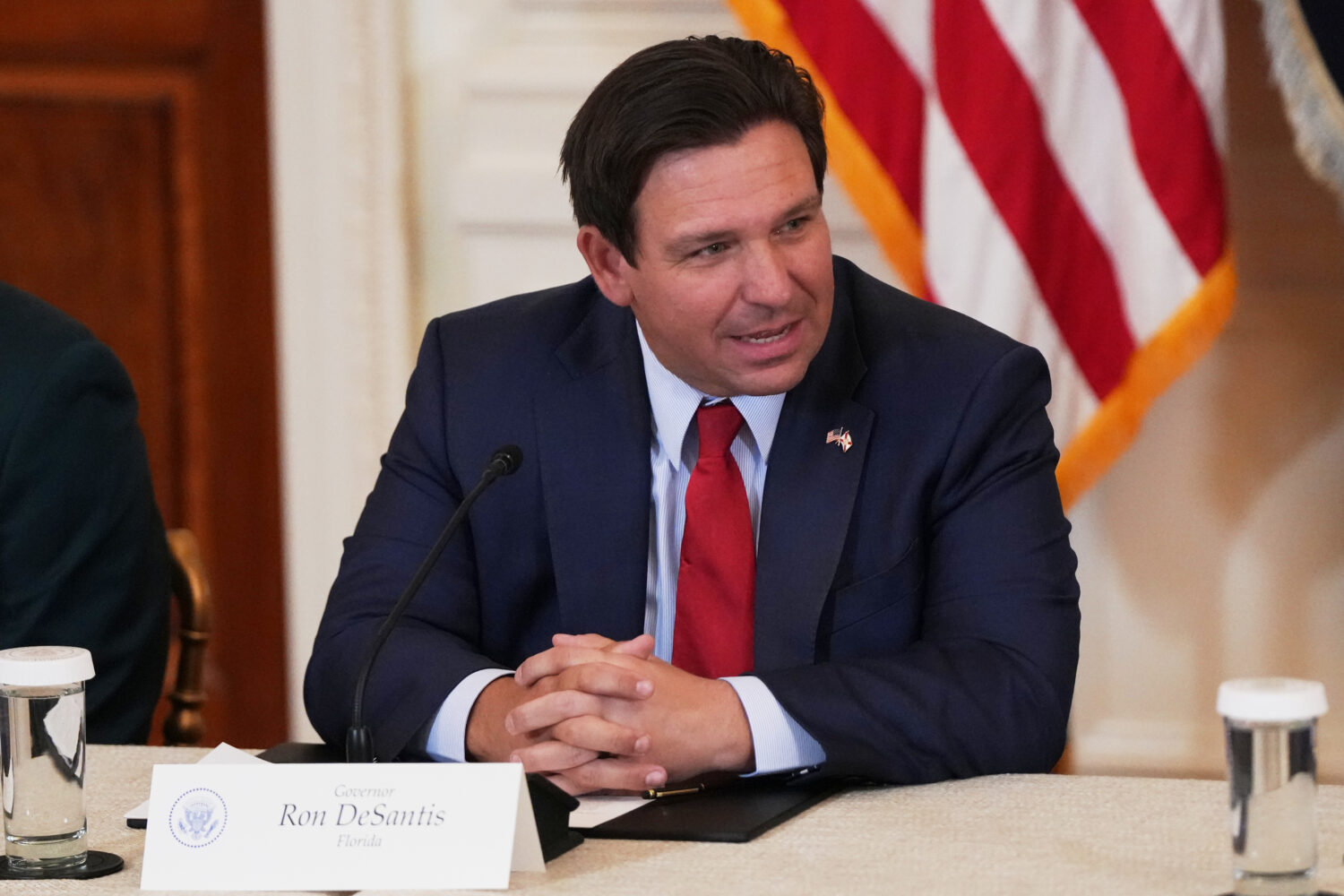 FILE - Florida Gov. Ron DeSantis is seen before a roundtable discussion on college sports in the Ea...