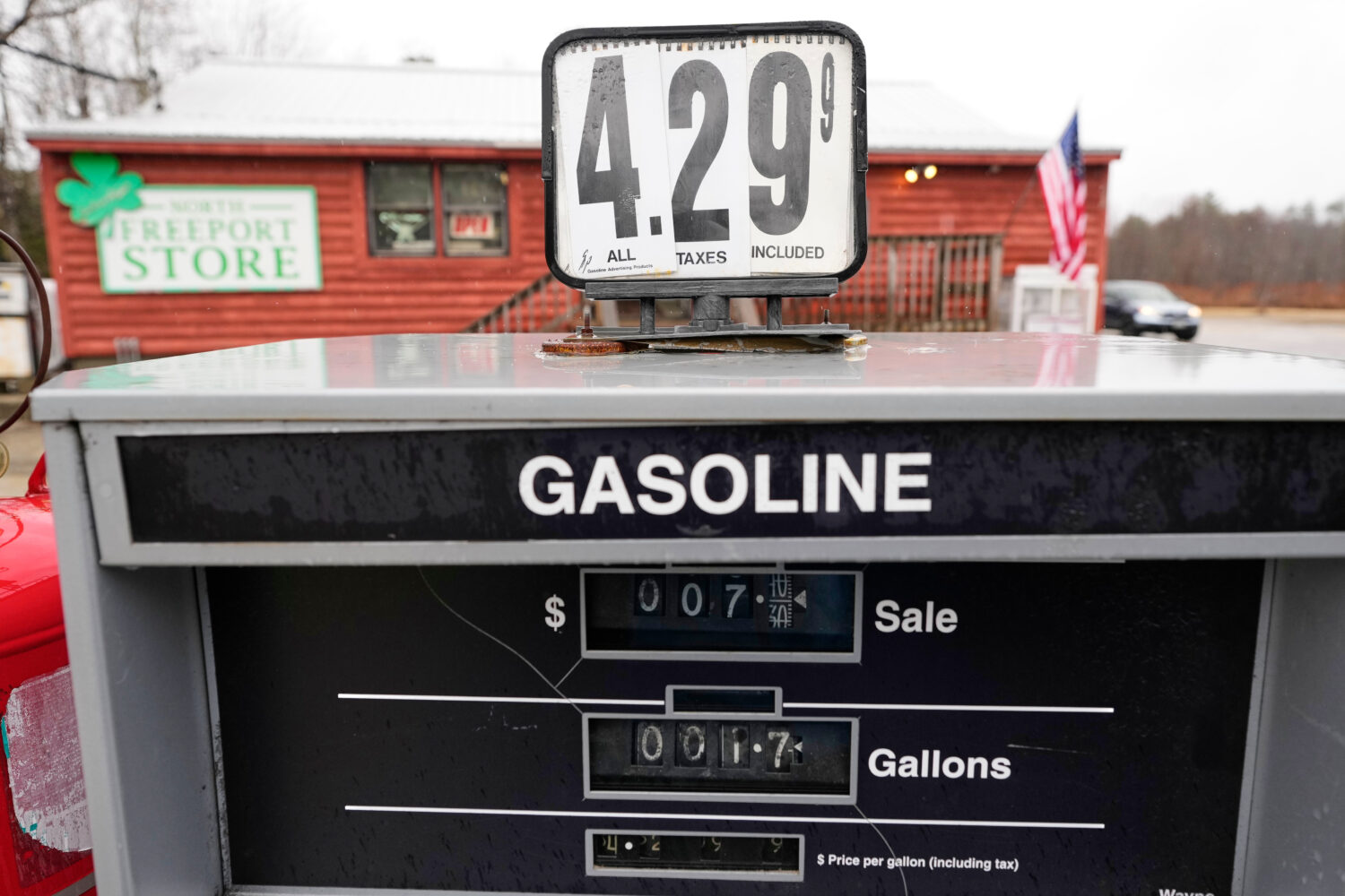 A sign shows the price of gas at a store, Tuesday, March 31, 2026, in Freeport, Maine. (AP Photo/Ro...