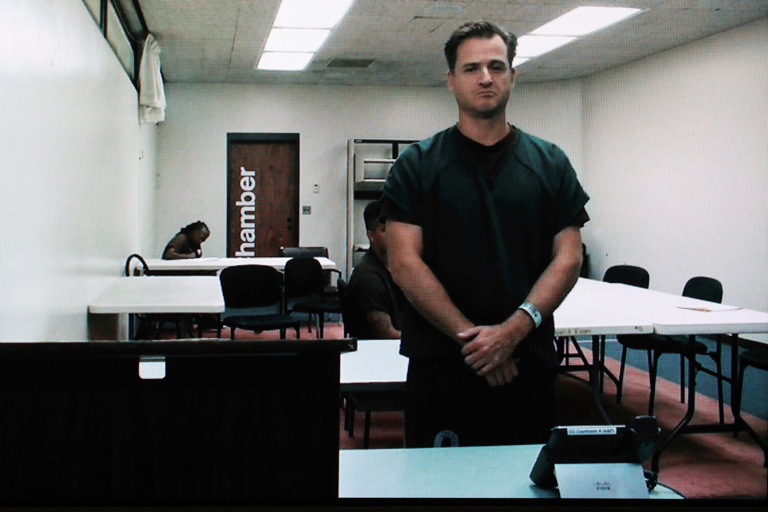 FILE - Hawaii doctor Gerhardt Konig appears before a judge via video during an arraignment hearing ...