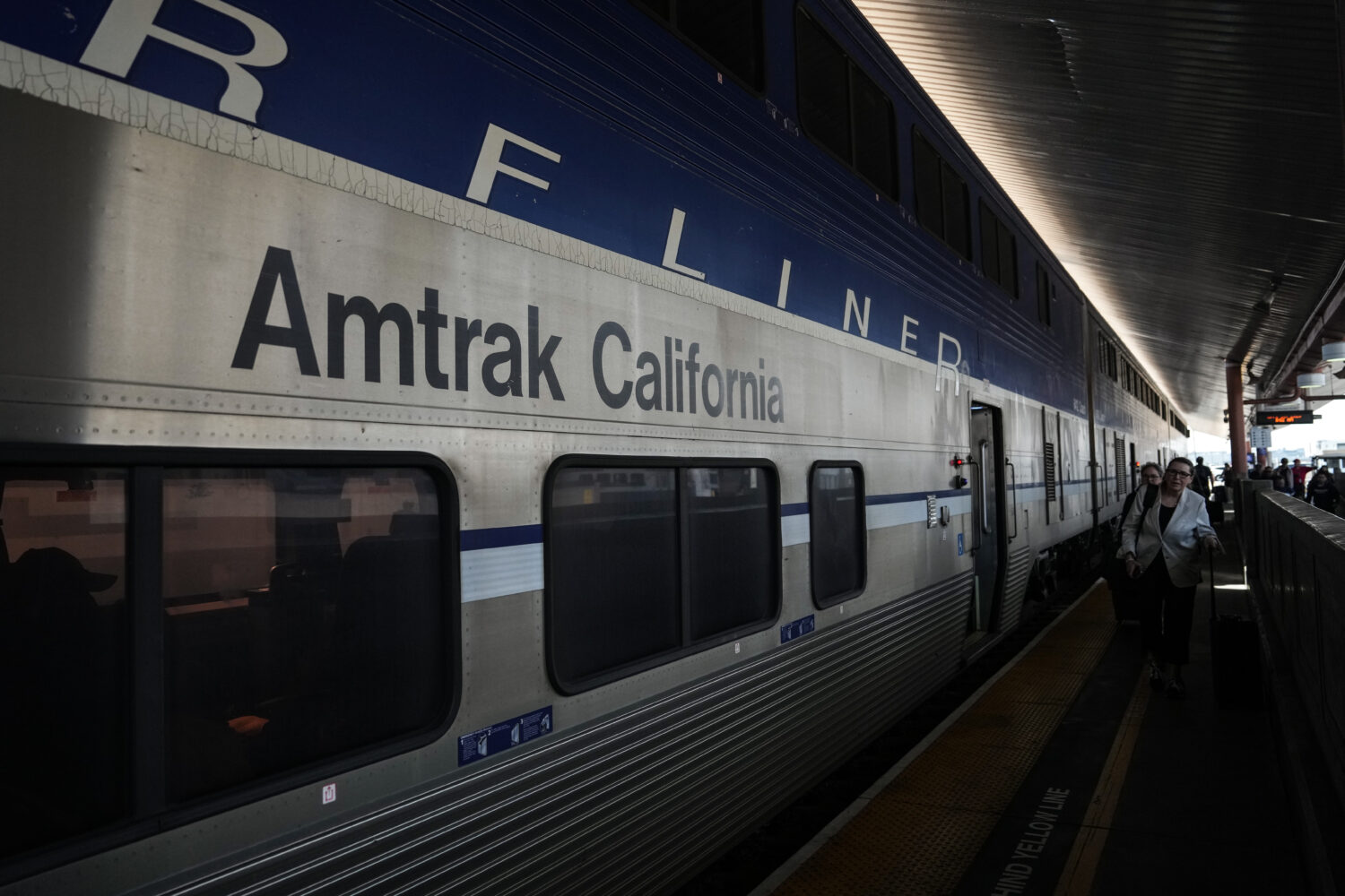 Passengers deboard an Amtrak train at Union Station in Los Angeles, Thursday, April 30, 2026. (AP P...