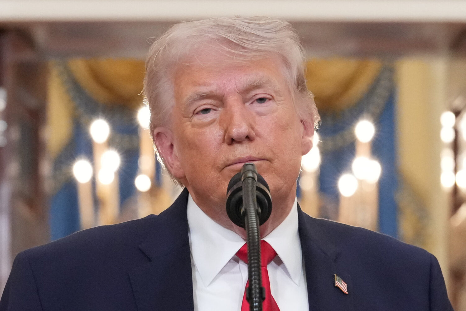 President Donald Trump speaks about the Iran war from the Cross Hall of the White House on Wednesda...