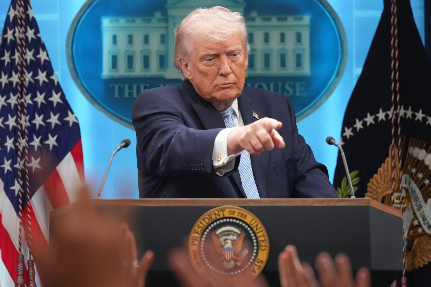 President Donald Trump speaks with reporters during a news conference in the James Brady Press Brie...
