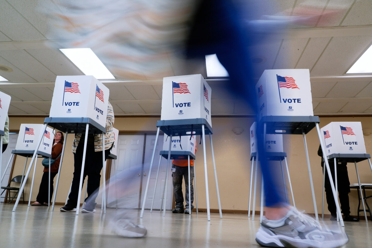 FILE - People vote in Oak Creek, Wis., on Nov. 5, 2024. (AP Photo/Morry Gash, File)Credit: ASSOCIAT...