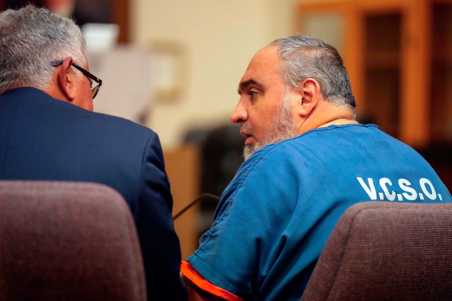 FILE - Attorney Ron Bamieh, left, listens to his client Loay Abdelfattah Alnaji in Ventura County S...