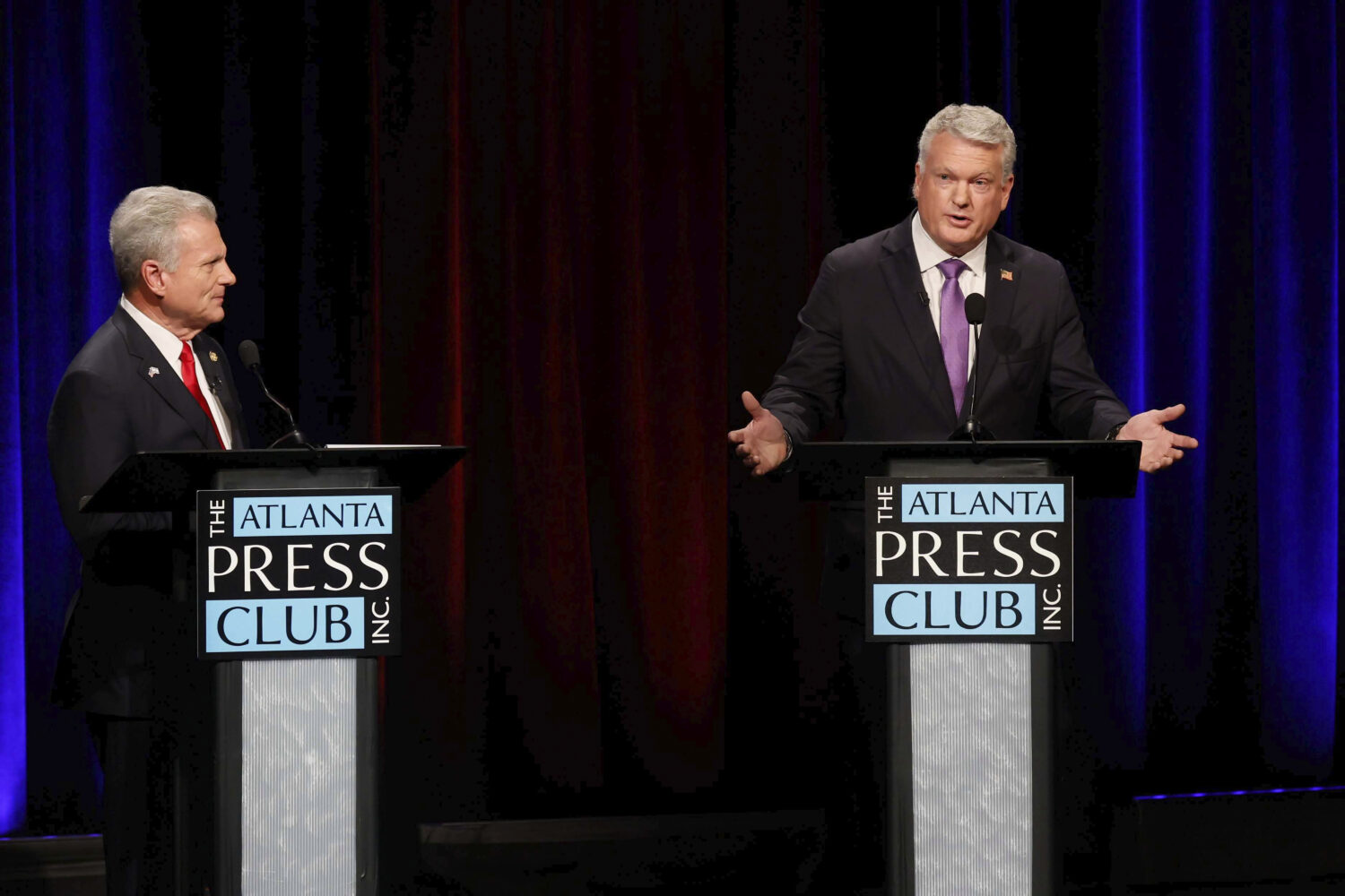 U.S. Rep. Mike Collins, R-Jackson, responds to a question from U.S. Rep. Buddy Carter, R-St. Simons...